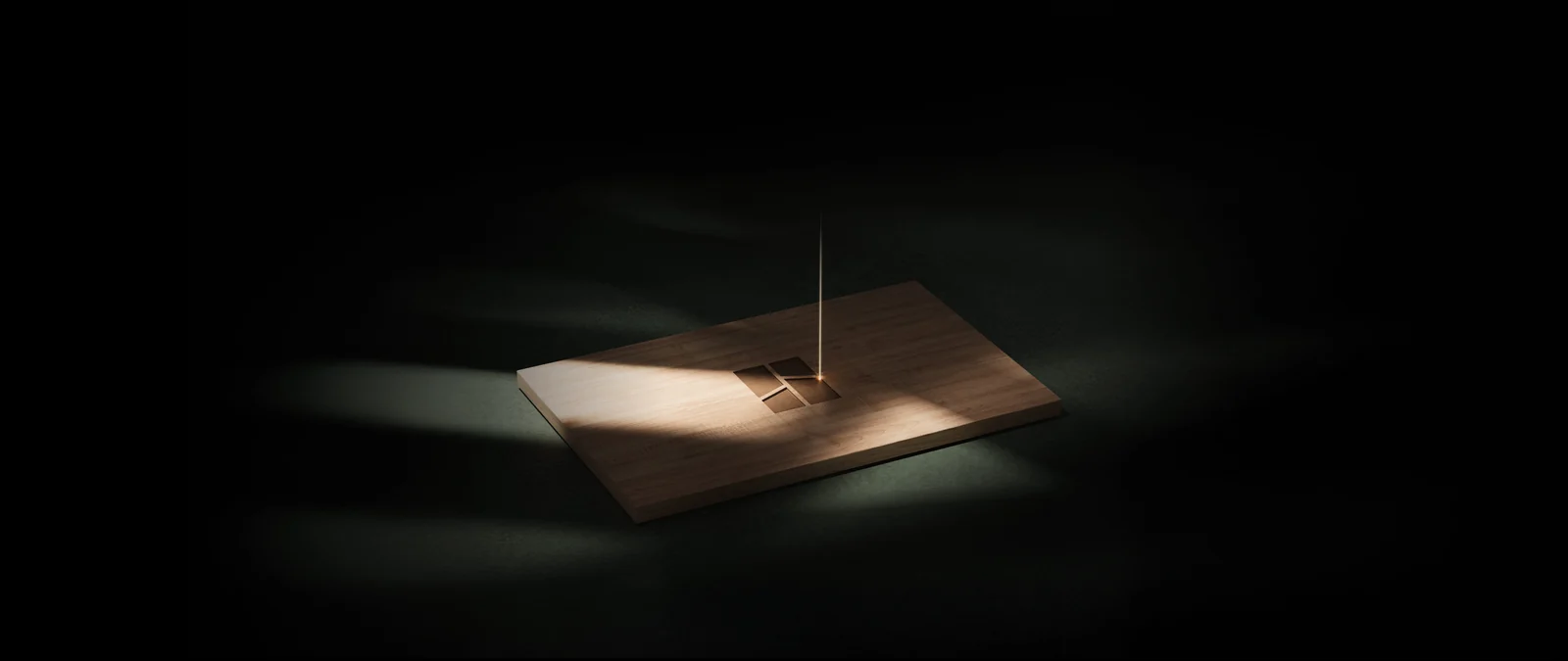 Bambu-Lab-Teaserbild zum R1: ein dünner Lichtstrahl schneidet in völliger Dunkelheit ein Loch in ein helles Holzbrett