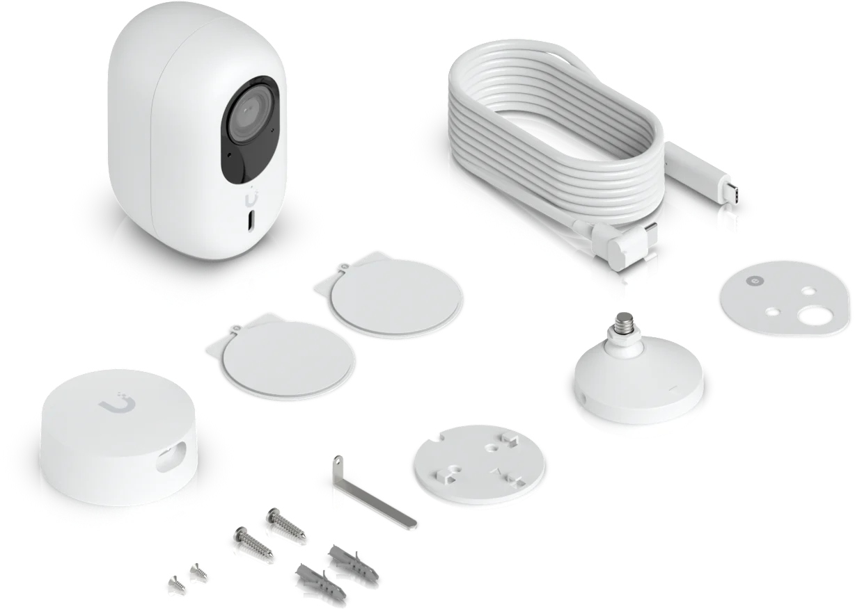 UniFi G6 Instant mit Lieferumfang: Kamera, Netzteil, USB-C-Kabel, Magnethalterung, Schrauben und Montagezubehör
