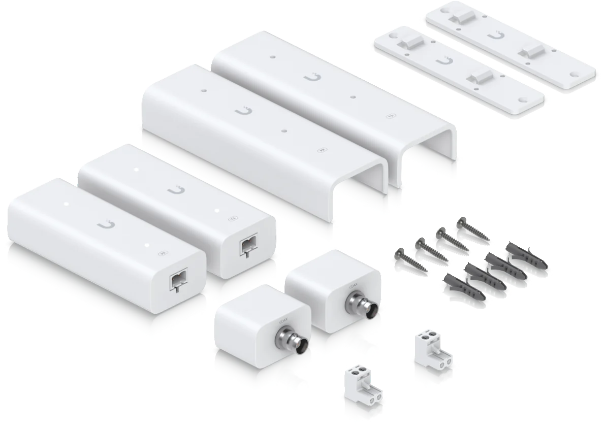 UniFi Retrofit-Set mit Lieferumfang: zwei Module, Adapter, Schrauben und Montagematerial